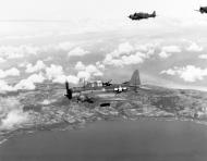 Asisbiz USS Lexington II (CV 16) SBD Dauntless dive bombers over Saipan on their way to bomb Aslito Airfield on 15th June 1944 80 G 236938