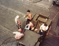 Asisbiz USS Lexington II (CV 16) gasoline crew relaxes around a Jeep flight deck tractor Gilberts Ops Nov Dec 1943 80 G K 15296