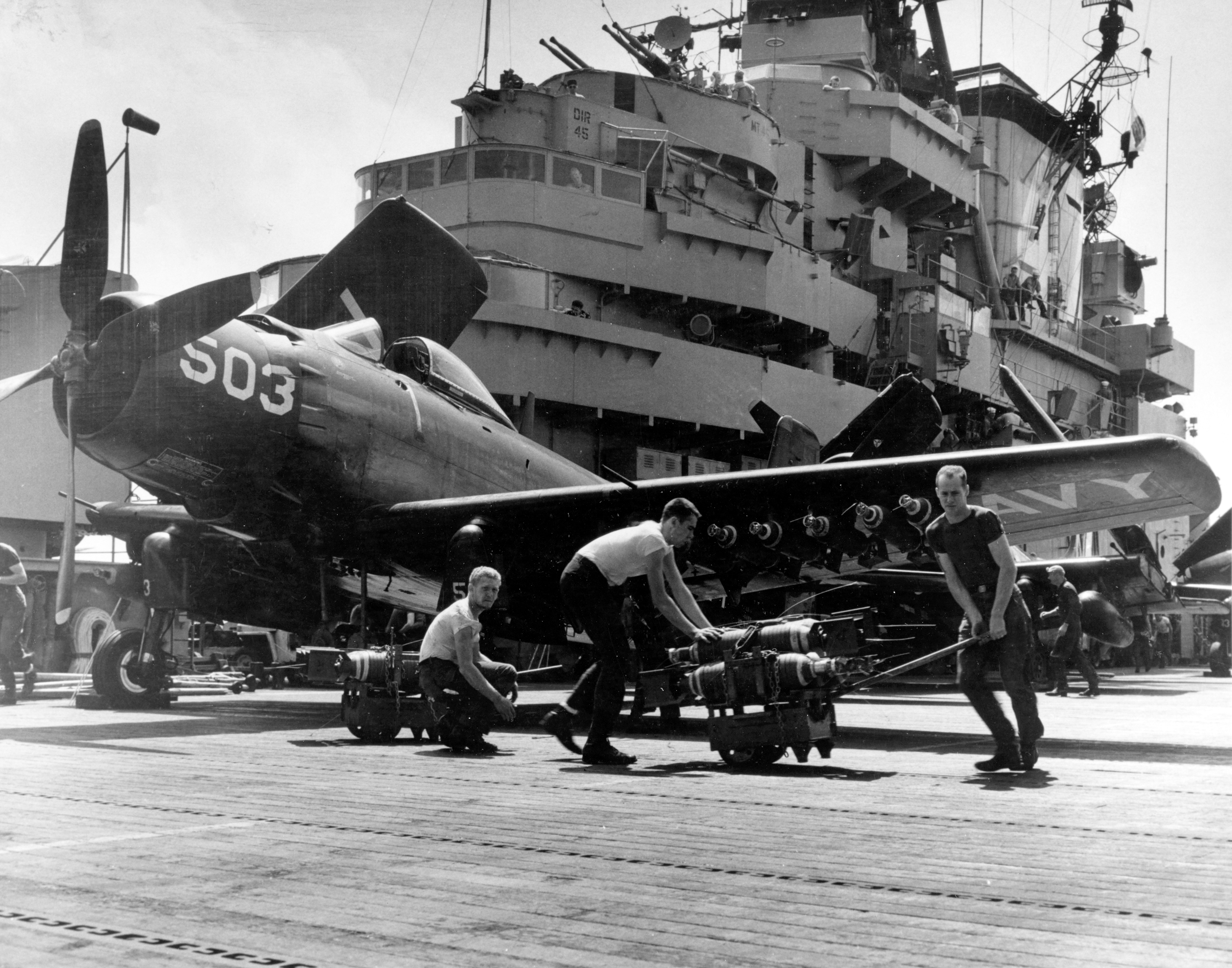 Douglas AD 4 Skyraider of VA 115 V503 being armed during operations off Korea 19th Oct 1950 80 G 420919