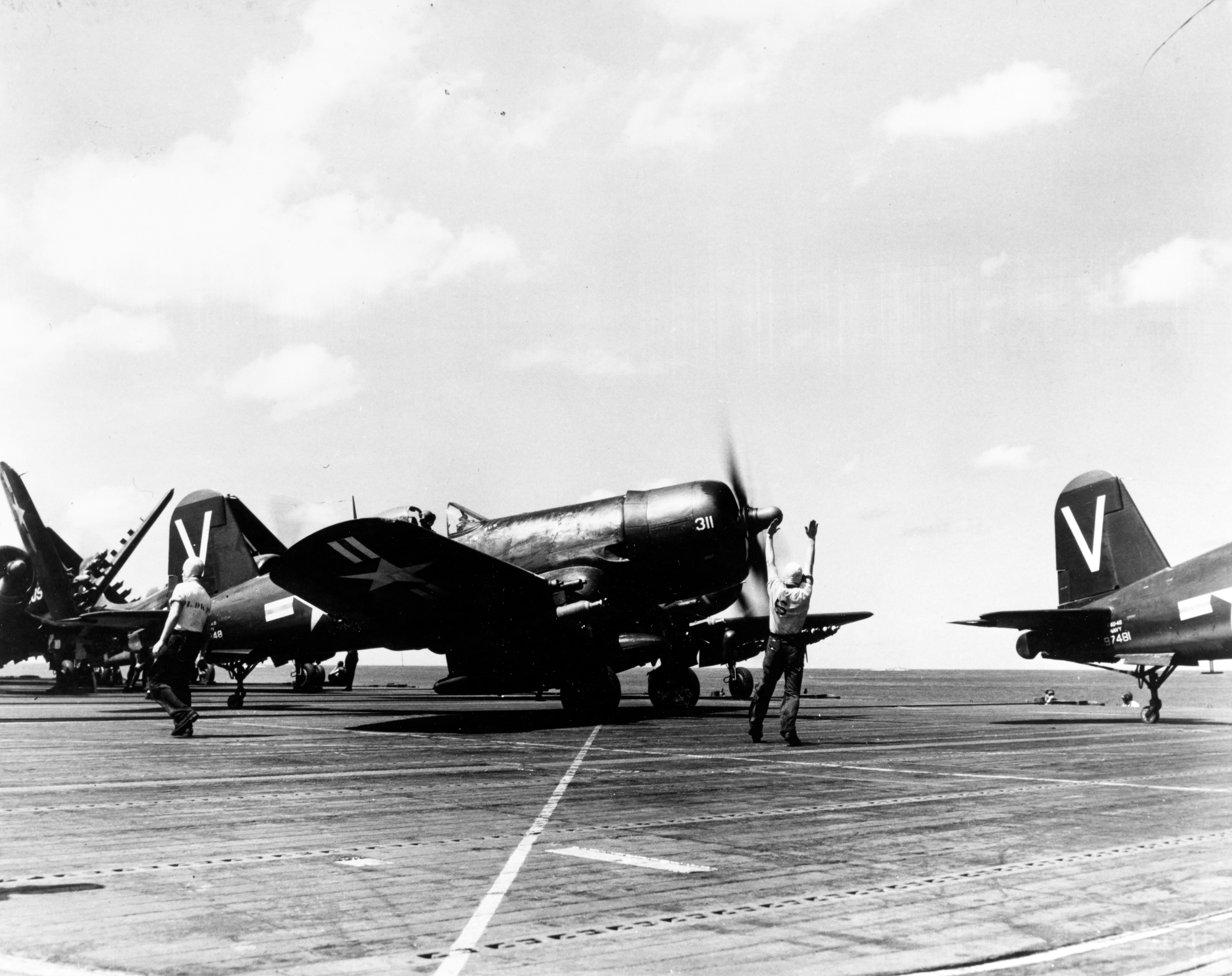 Vought F4U 4B Corsairs of VF 113 V311 9xx48 with 97481 prior to a strike mission in Korea 19th Oct 1950 80 G 420920