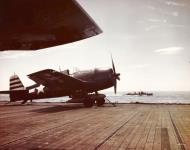 Asisbiz Grumman F6F Hellcat VBF 12 parked aboard USS Randolph (CV 15) March 1945 80 G K 5339