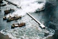 Asisbiz SB2Cs attack a small craft in Hachinohe harbor North Honshu on 14th July 1945 by USS Randolph (CV 15) 80 G 490114