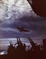 Asisbiz USS Randolph (CV 15) Grumman F6F Hellcat coming into landing May 1945 80 G K 5370