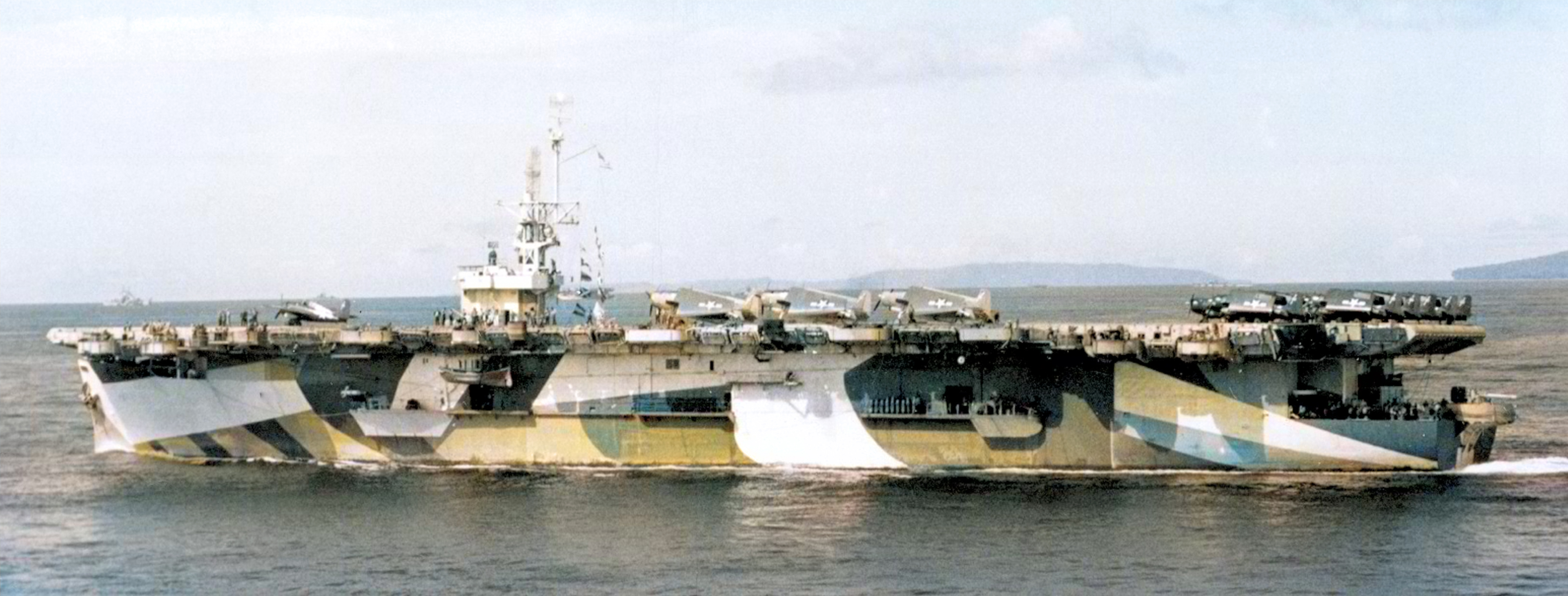 Asisbiz USS Savo Island (CVE-78) entering the Sulu Sea seen from USS West Virginia (BB-48) on 3rd Jan 1945