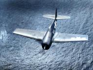 Asisbiz Grumman F6F 5 Hellcat White D11 in flight from USS Suwannee (CVE 27) April 1945 80 G 349414