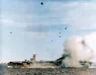 Asisbiz Grumman F6F Hellcat pulls out after chasing Zeke which crashed into USS Suwannee (CVE 27) Leyte Gulf 25th Oct 1944 NH 71524