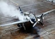 Asisbiz Curtiss SB2C 4E Helldivers VB 87 V209 lands damaged on USS Ticonderoga (CV 14) May 1945 01