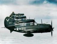 Asisbiz Curtiss SB2C 4E Helldivers VB 87 V211, 210, 206 and 205 flying from USS Ticonderoga (CV 14) May 1945 01