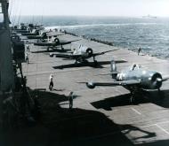 Asisbiz Grumman F6F Hellcats prepare to take off USS Ticonderoga (CV 14) for strikes in Manila Bay Nov 1944 80 G 305244