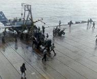 Asisbiz USS Ticonderoga (CV 14) SB2C 4E Helldiver (VB 87) V215 landed damaged after operations off Japan July Aug 1945 01