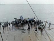 Asisbiz USS Ticonderoga (CV 14) SB2C 4E Helldiver (VB 87) V215 landed damaged after operations off Japan July Aug 1945 02