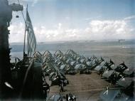 Asisbiz USS Ticonderoga (CV 14) flight deck when anchored off Okinawa 1945 01
