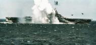 Asisbiz USS Ticonderoga (CV 14) photographed after a near miss with a kamikaze attack 5th Nov 1944 01