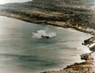 Asisbiz Japanese Cargo Ship SS Shoun Maru under attack by USS White Plains (CVE 66) aircraft off Rota Island Marianas 23rd Jun 1944 NH 95566