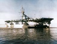 Asisbiz USS White Plains (CVE 66) with Dazzle Camouflage in San Diego harbor California April 1944 80 G 302258