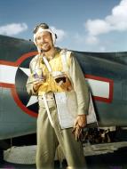 Asisbiz Douglas SBD crew Ensign Frederick J Joyce USNR drinks pineapple juice before taking off USS Yorktown II (CV 10) Oct 1943 80 G K 15572