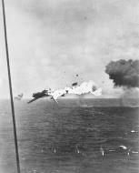 Asisbiz Japanese Jill torpedo bomber explodes after a direct hit off Kwajalein Atoll 4th Dec 1943