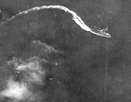 Asisbiz Japanese heavy cruiser maneuvers while under attack by TF 58 planes 20th June 1944 80 G 238164