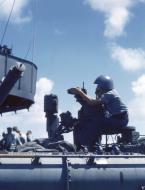 Asisbiz USS Yorktown II (CV 10) Gun Director uses sights during gunnery operations 80 GK 14761