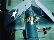 Asisbiz USS Yorktown II (CV 10) pilot of SB2C talks to Plane Captain before takeoff 80 GK 14813
